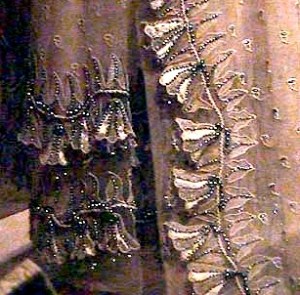 Detail of bells and net embroidery