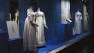 Exhibits with dresses, drawings and artifacts