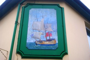 Pub sign on the side of The Princess Alexandra pub