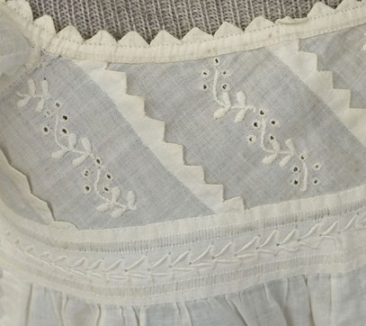 closeup Infant's hand-embroidered dress, c.1815-1820