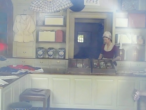 Inside the milliner's shop