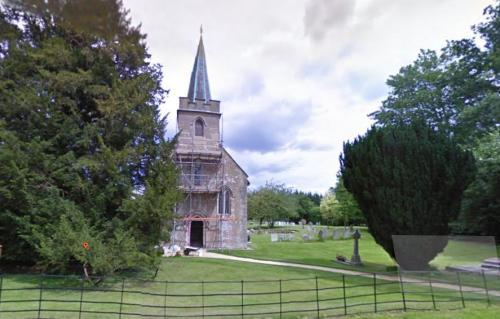 St. Nicholas as seen from the road, with the graves of the Austen family to the right.