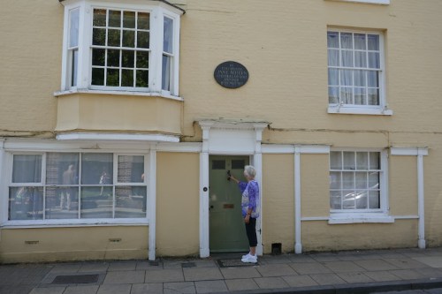 7_P1040139_website_nancy_at_front_door[1]