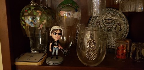 Image of Bad Ass Jane among the wine glasses